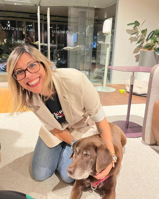 Lady holding dog at Design for a Difference event 2026