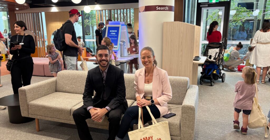 Caloundra Library Opening Event Bunin and Schiavello representatives sitting on new furniture at Caloundra Library Opening Event